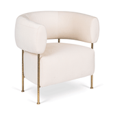 Buda Lounge Chair with modern design, plush upholstery, and hammered texture brass finish on stainless steel legs. Perfect lounge chair for bedroom.